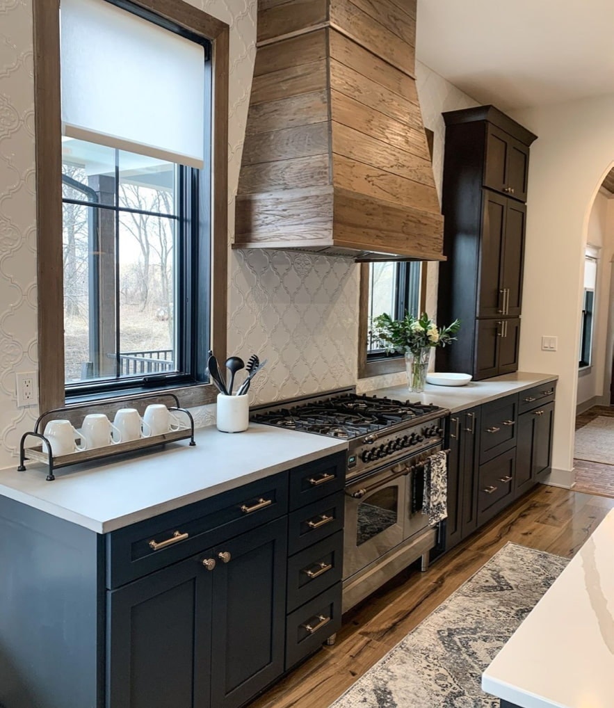 beautiful rustic kitchen with large casement windows including roller shades