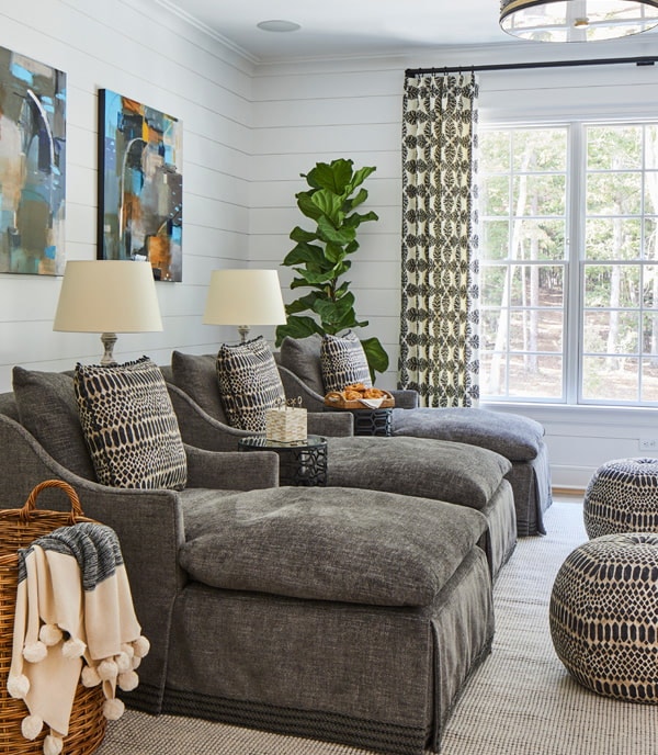 patterned curtains add interest to a living room with custom furniture