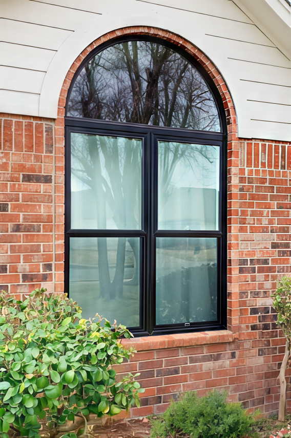 Newly installed Pella arched fiberglass window on Edmond home.