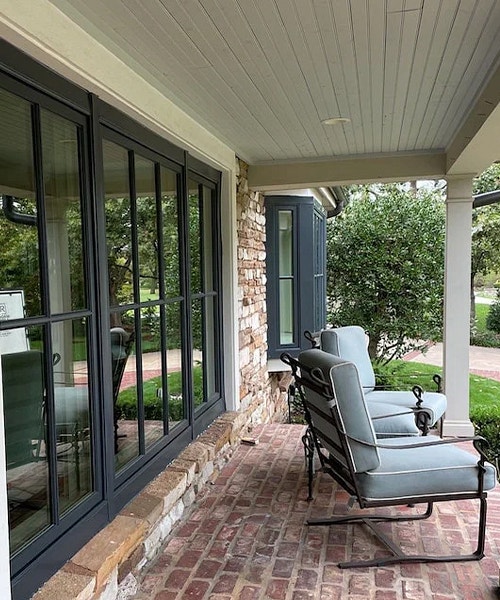 new black pella windows on front porch