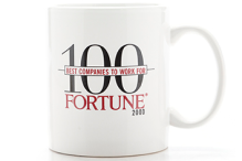 The Fortune 100 logo, dated from 2000, on a coffee mug.