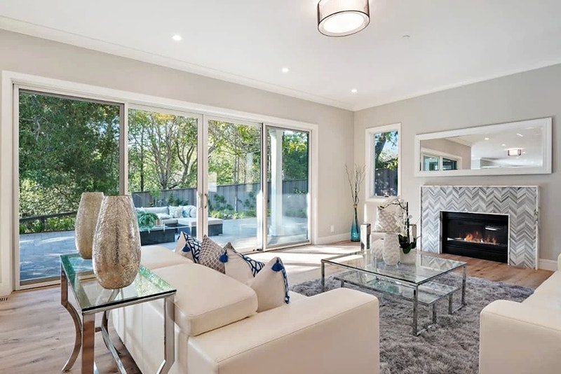 Sliding Glass Doors Complement Modern Living Room Design Hillsborough living room with sliding glass doors from Pella.