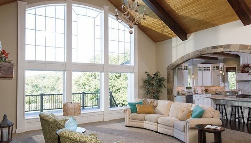 a floor-to-ceiling custom window configuration on a vaulted room