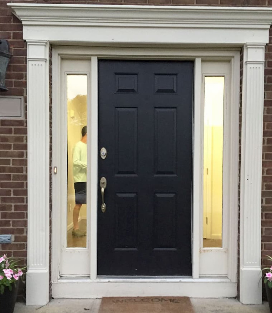 Black front entry door before