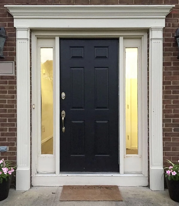 Outdated front door of Grove City home.