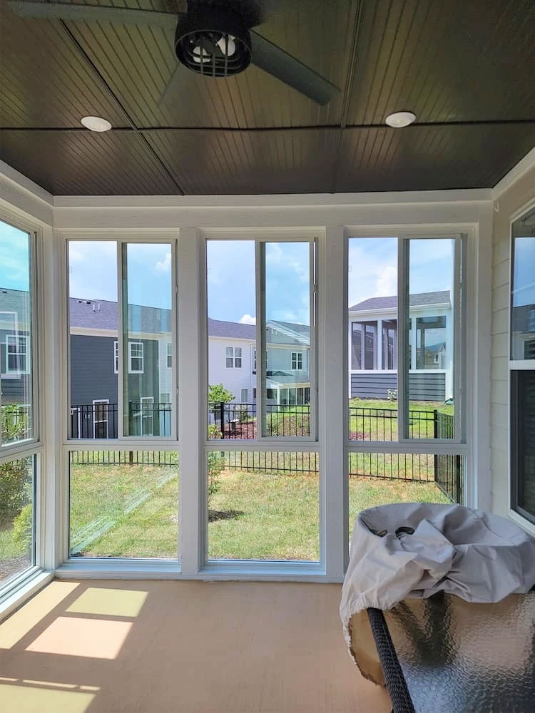 Sliding windows in a Crozet four season room.