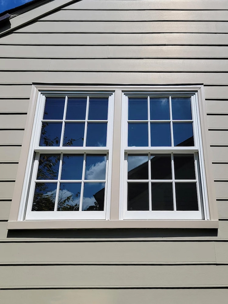 Closeup of replacement window of Henrico Colonial home.