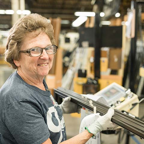 woman working in pella factory