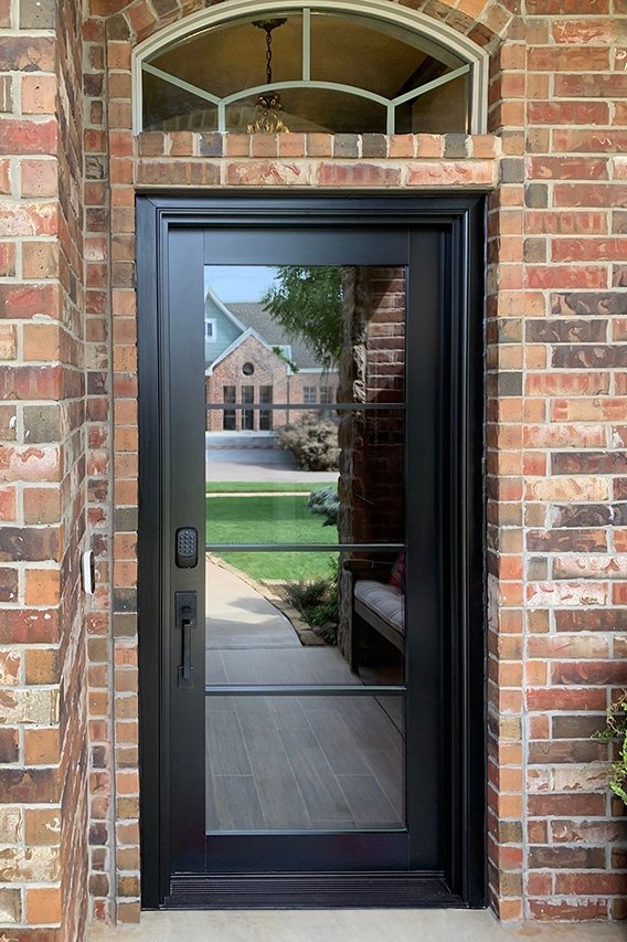 After image of new black front door with glass in Oklahoma City.