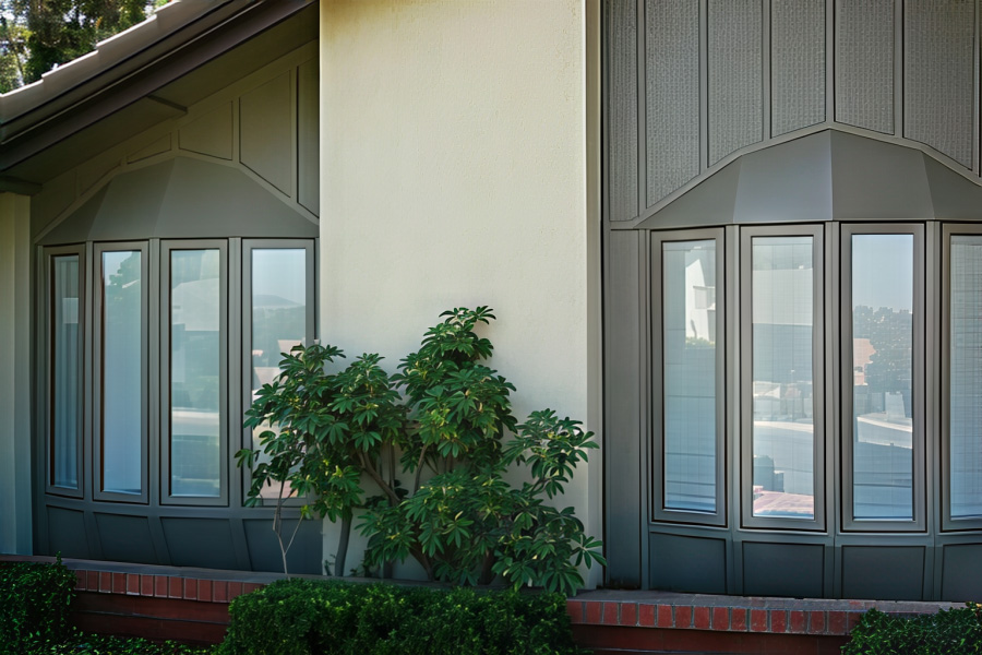 two sets of bay windows on a Los Angeles 70s-style home.