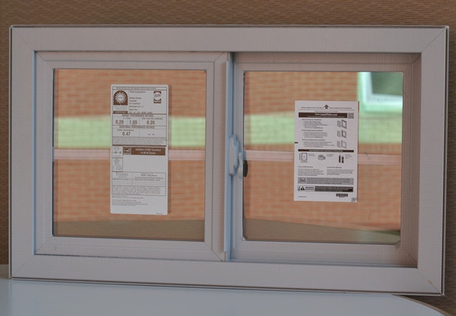 A white sliding window with labels containing window information on each panel.