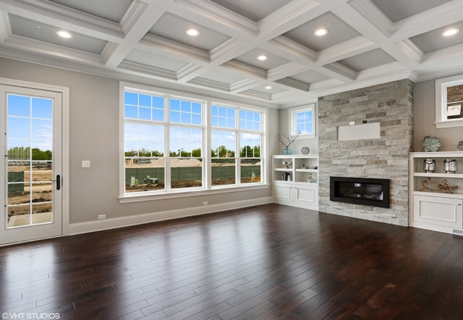 Living Room with crown molding and dark wood floors.