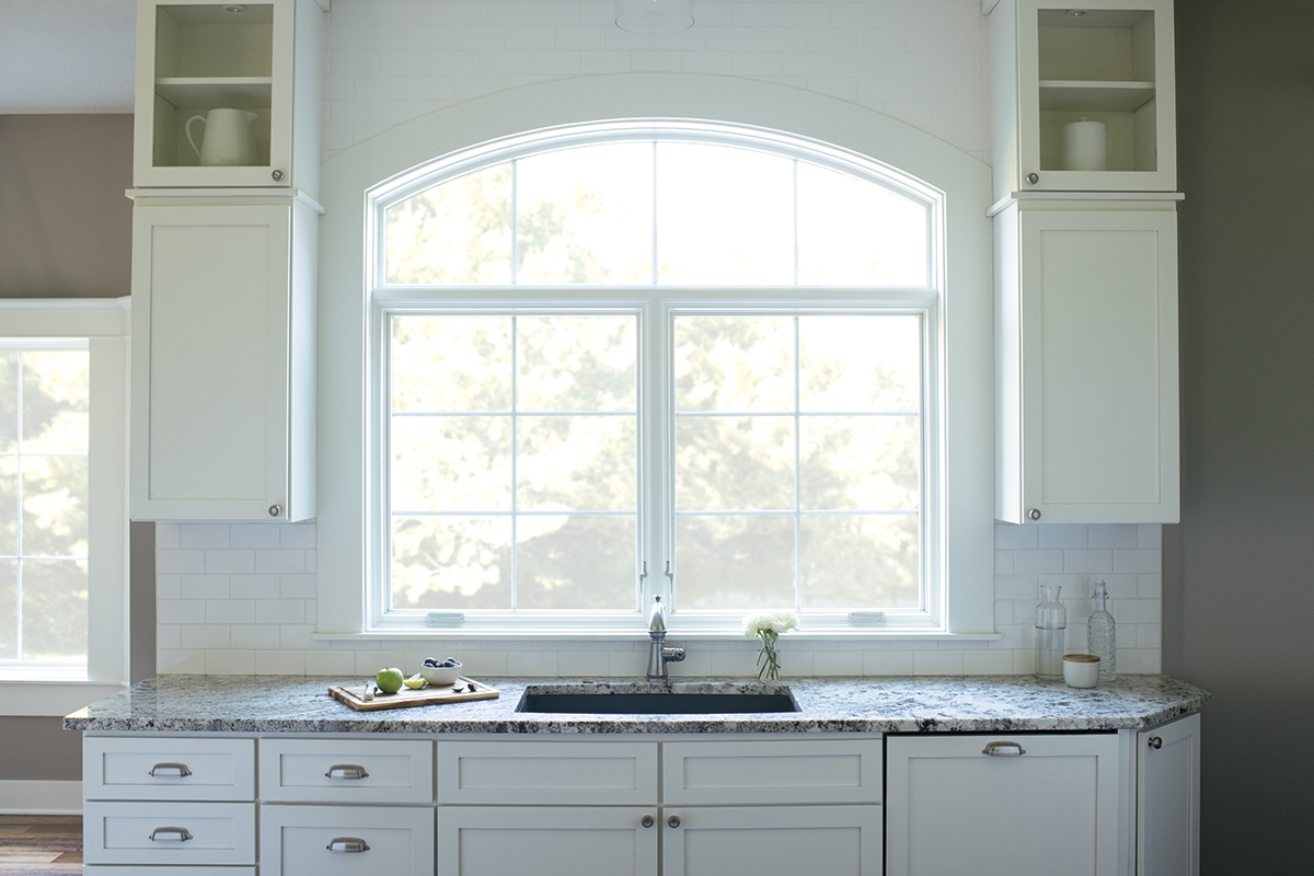 White toned kitchen with Lifestyle series window.