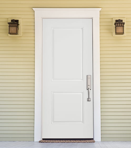 white solid steel front door on a yellow home exterior