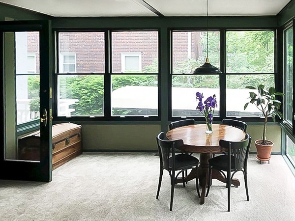 Interior image of historic Cincinnati home sunroom with newly installed Pella casement windows
