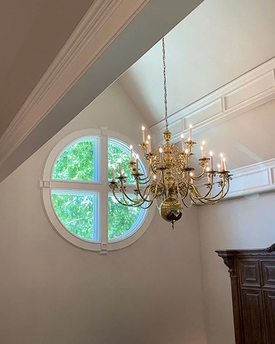 A custom crafted circle window in a Norman Education building stairwell.