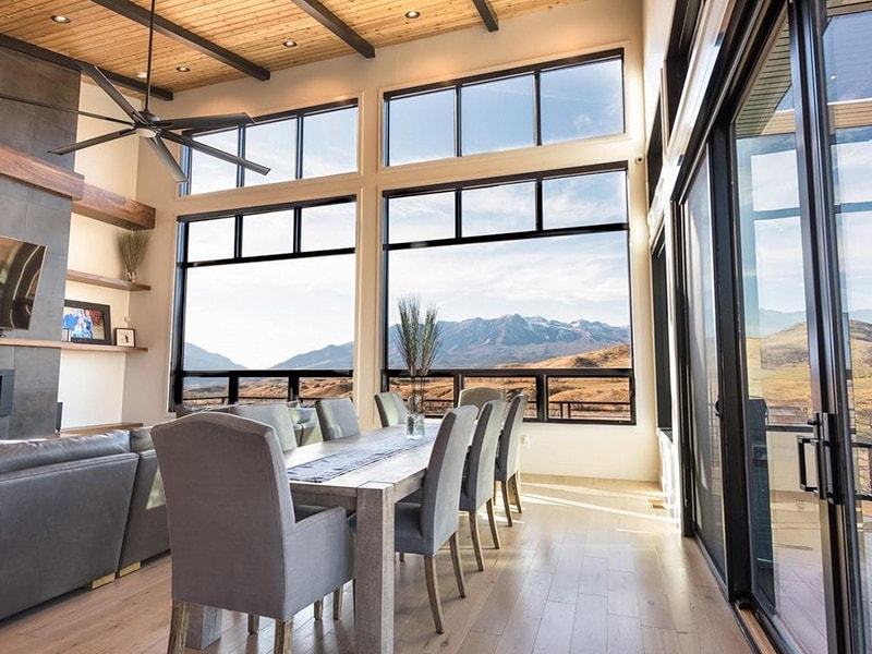 Two floor-to-ceiling window units with a mountain view