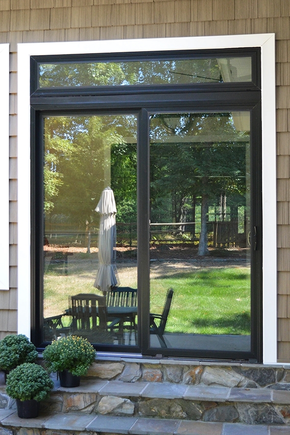 Sliding patio door on Richmond home connecting indoor space and outdoors.