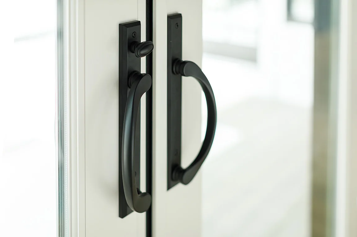 black-handle-white-frame-patio-doors.webp