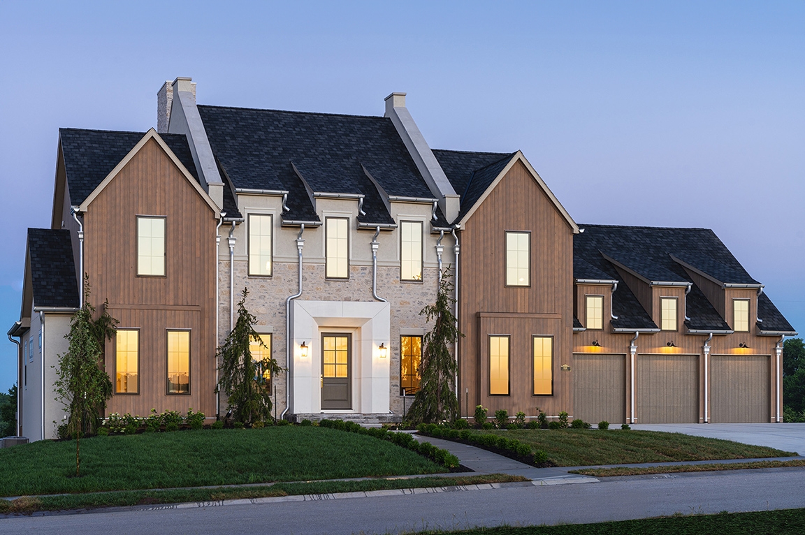 Modern traditional home in Kansas City with newly installed black Pella Windows.