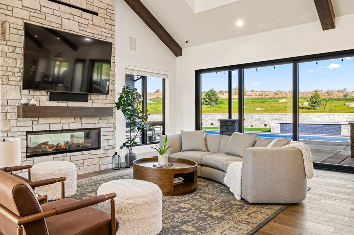 Living room in Grand Junction home highlighting Pella casement windows.