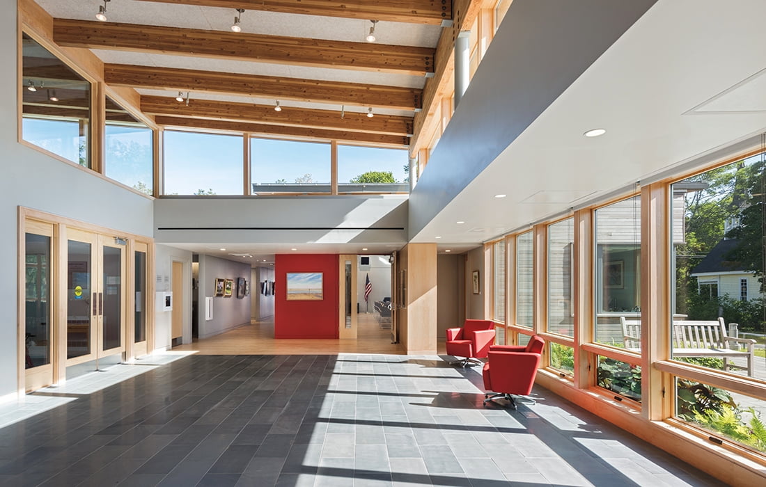 Interior view of Eastham library addition highlighting customized windows allowing a unique architectural design. 