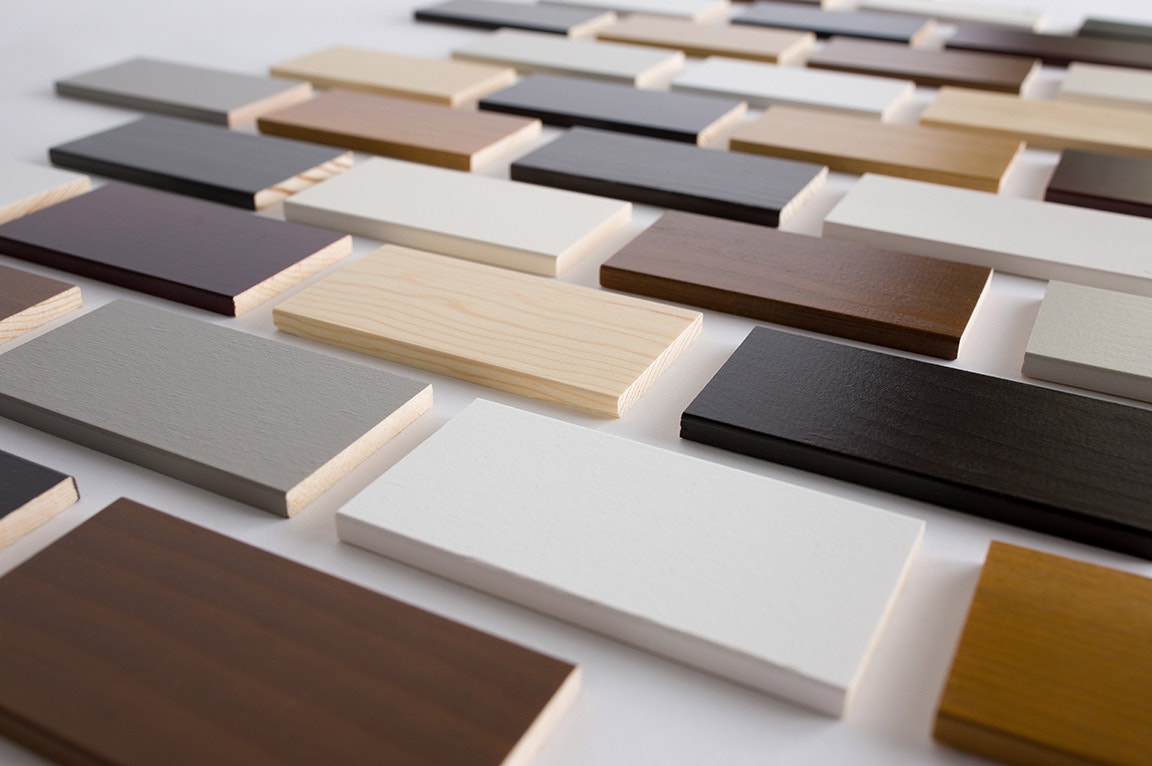 Various wood samples in different colors and finishes.