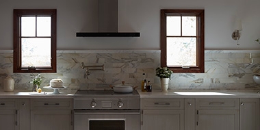 kitchen with two dark-material windows