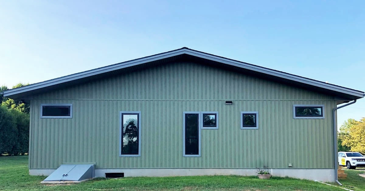 Backyard view of modern Dillsburg home with newly installed Pella fiberglass windows.