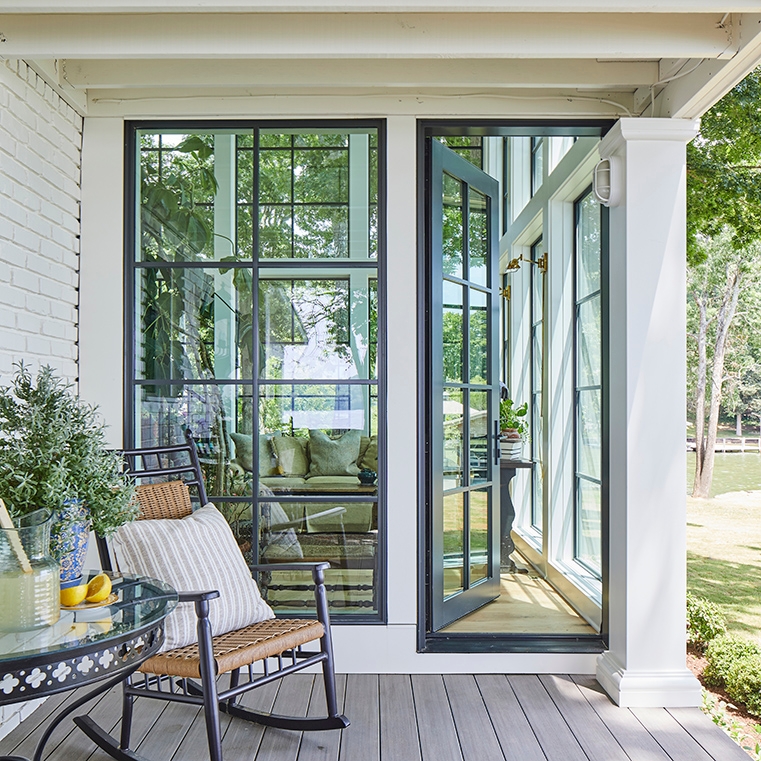 After image of Nashville lake house featuring a new black patio door. 