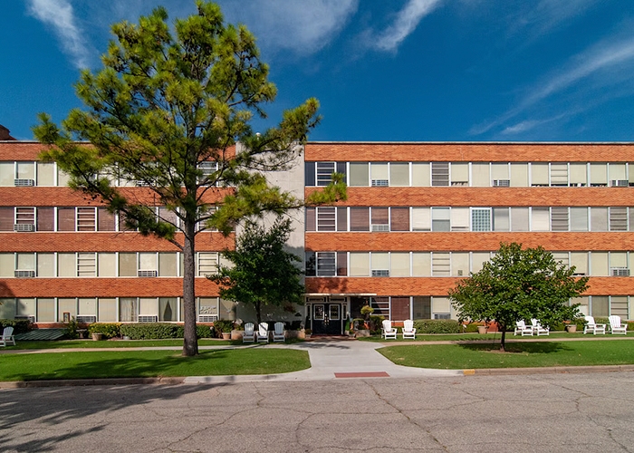 apartment building old white windows 