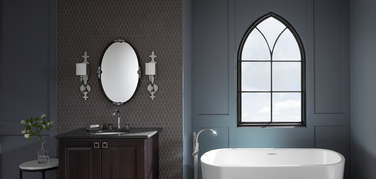 custom gothic window over a white tub in a bathroom