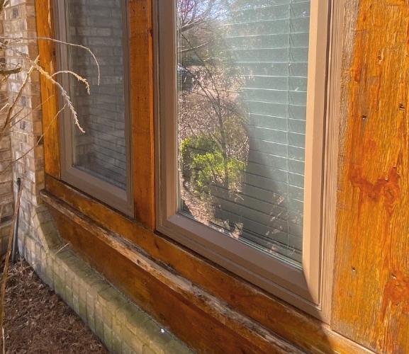Closeup of outdated window on Arlington home. 