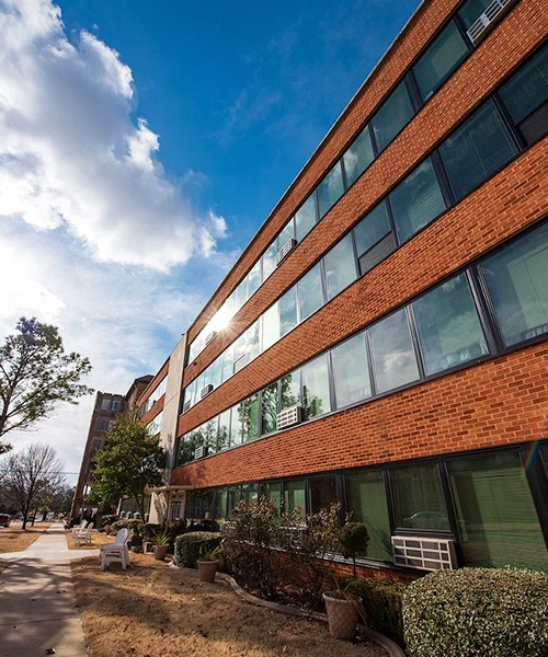 shiny new black windows on apartment building 