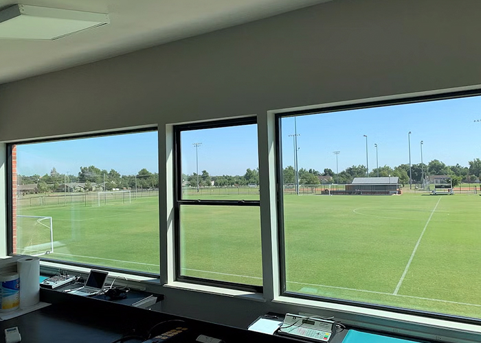 mixture of vinyl and fiberglass windows soccer press box