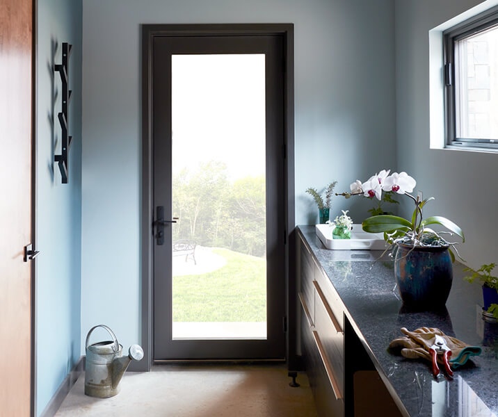 reserve-contemporary-hinged-door-blue-walls