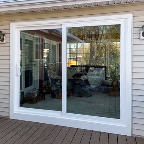 Newly installed Pella 250 series sliding patio door on Burlington home.