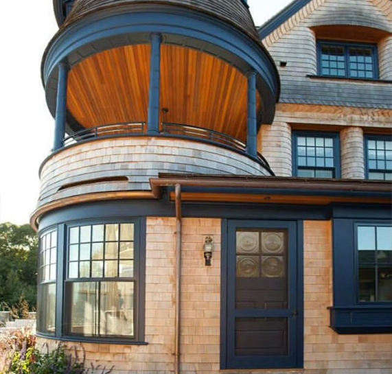 blue curved windows on a coastal Rhode Island home