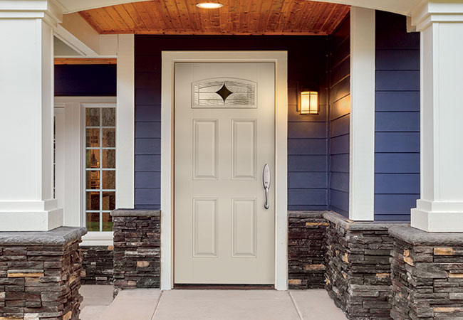 White entry door on blue house.
