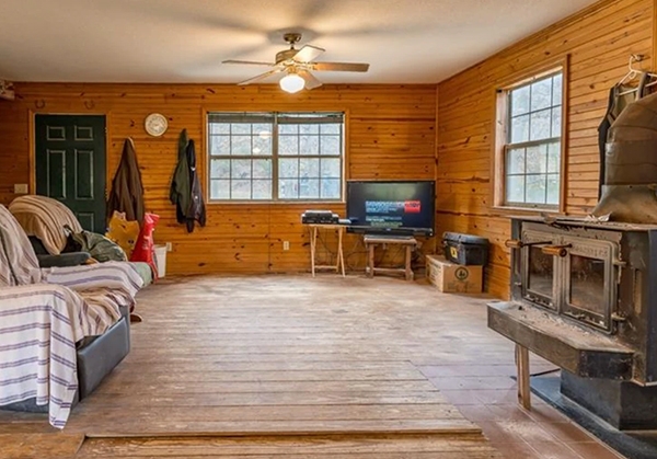 Outdated cabin living room in Fayetteville. 