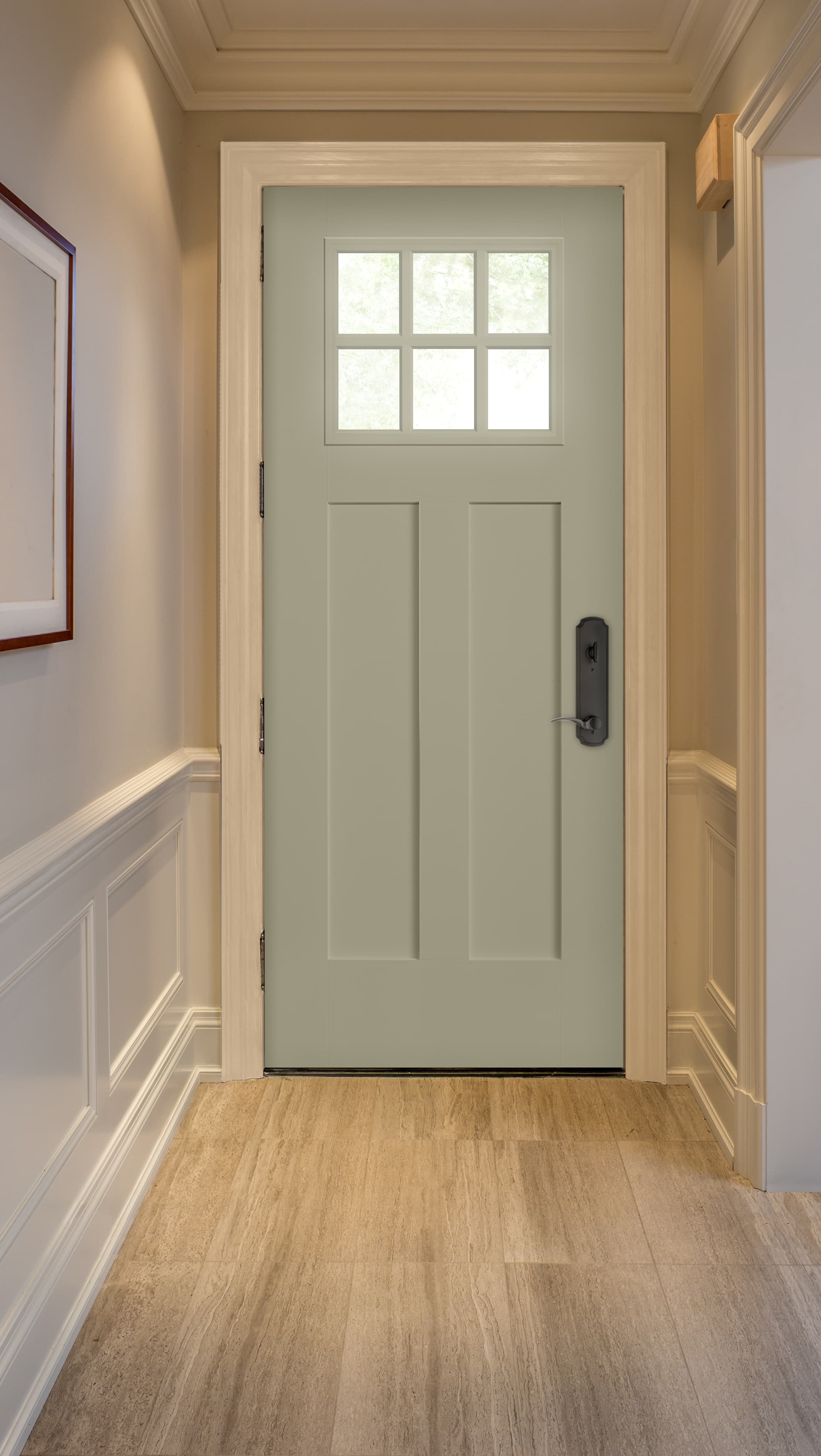 Blue craftsman front door lights up neutral color entryway