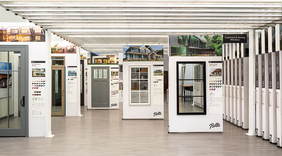 Several window and door samples on a Pella floor display