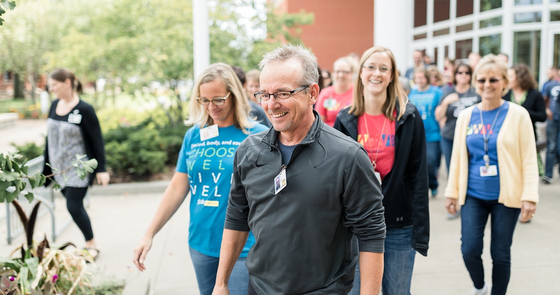 pella team members walking for charity