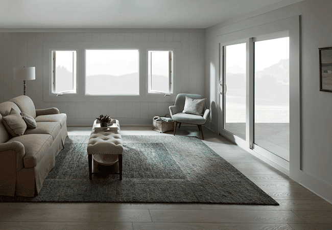 Modern living space with sliding glass door and natural light.