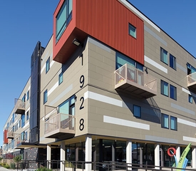 Corner view of The Rose multifamily housing development.