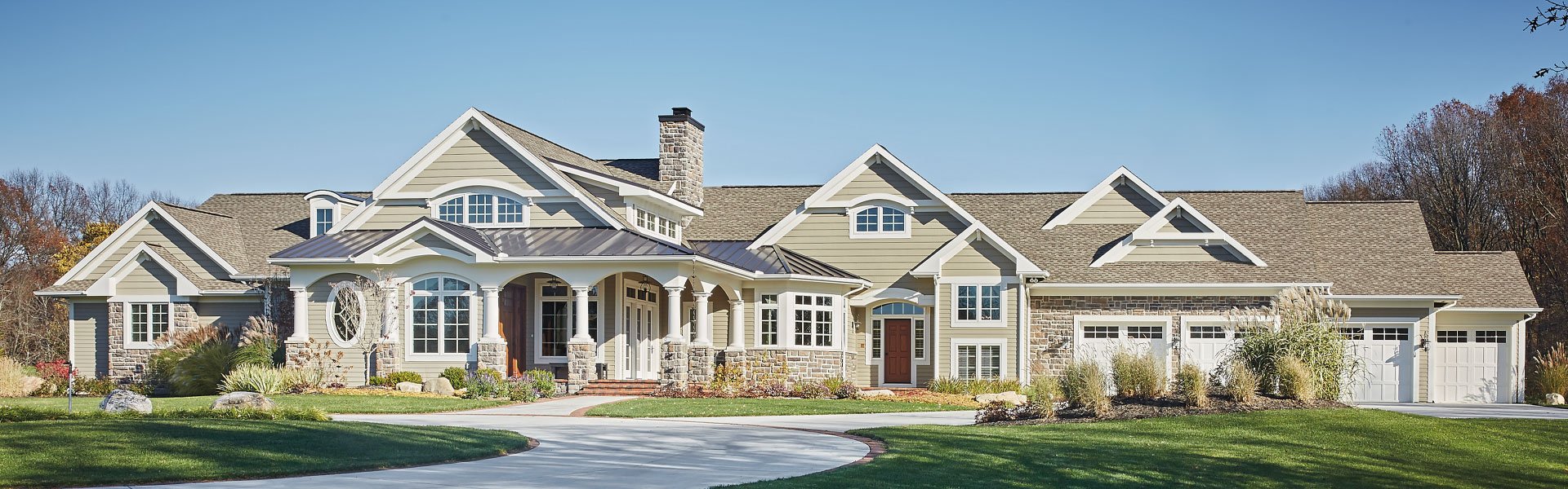 expansive and grand home made with pella reserve traditional style windows