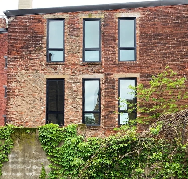 Exterior image of a historical Cincinnati townhome with newly installed Pella windows.