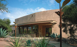 exterior of a southwestern building with wood installation