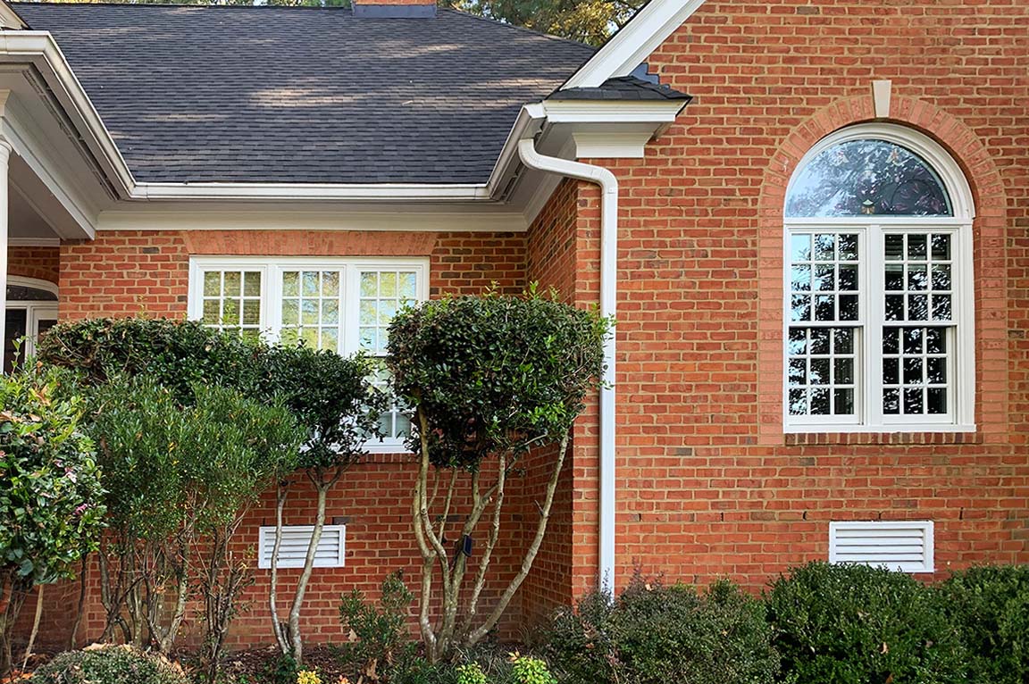 Midlothian home with newly installed Pella wooden double-hung windows.