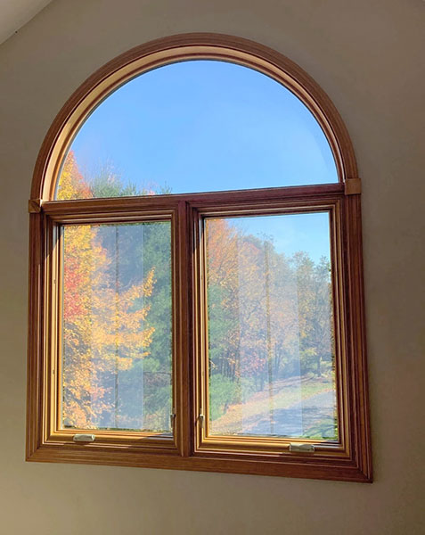 Newly installed high-performing wood window in an Amherst home. 